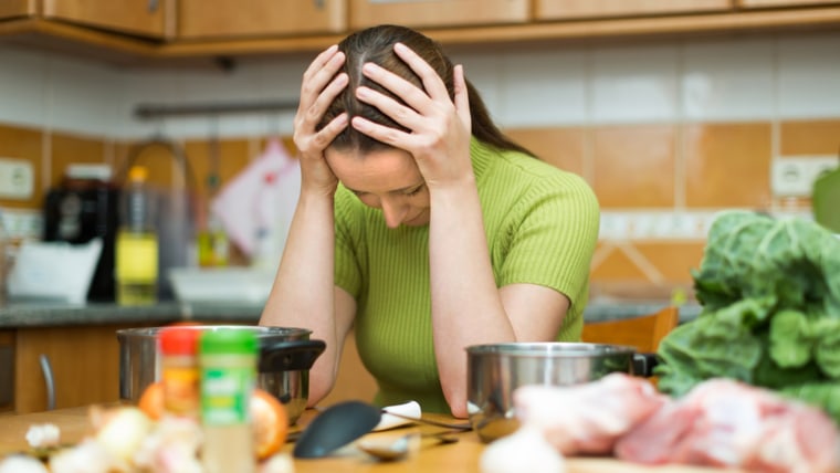 Exhausted female needs to make dinner after working day ; Shutterstock ID 241001536; PO: TODAY.com