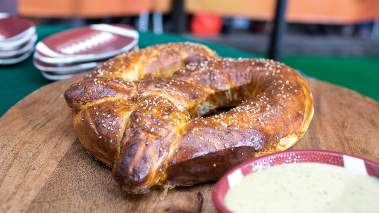 Brandi Milloy's tailgate recipes for bacon crack, chocolate chip cookie dough footballs and a super-sized victory pretzel