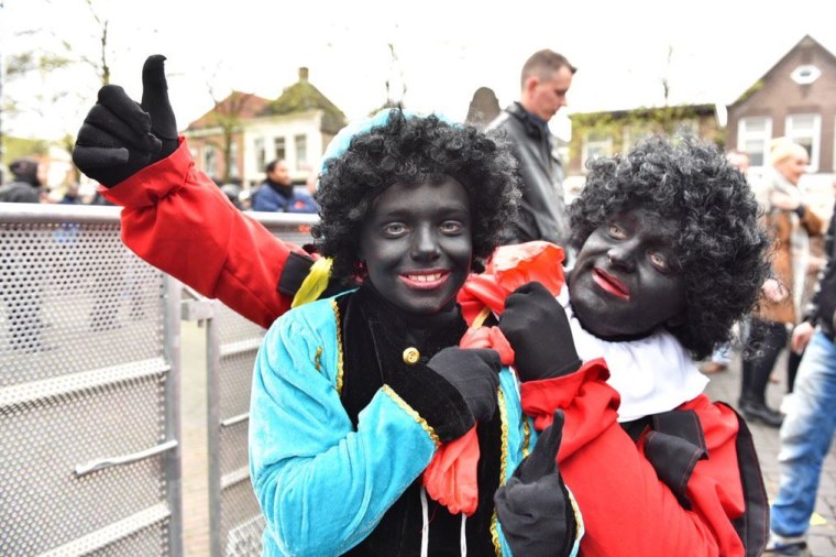Family members young and old dressed as the controversial character Black Pete during a recent Sinterklaas parade.