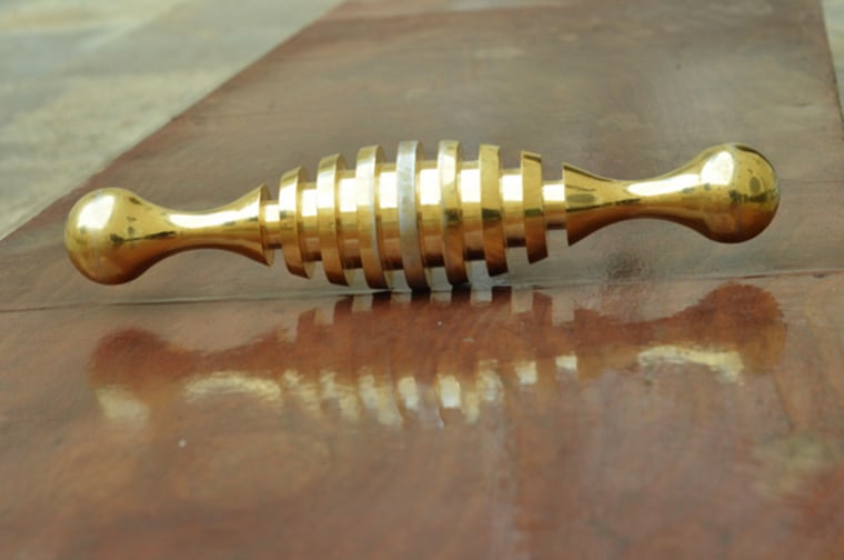 This mysterious, shiny, gold object was found on the grounds of a Jerusalem cemetery.