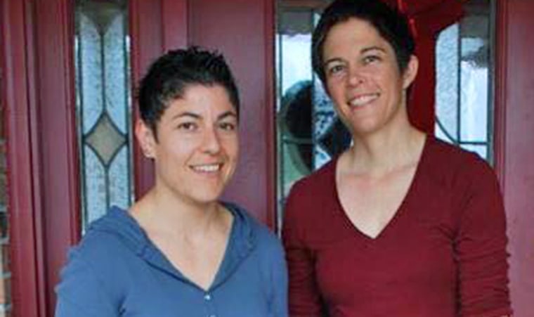 Air Force Major Adrianna Vorderbruggen, left, and her wife, Heather Lamb.