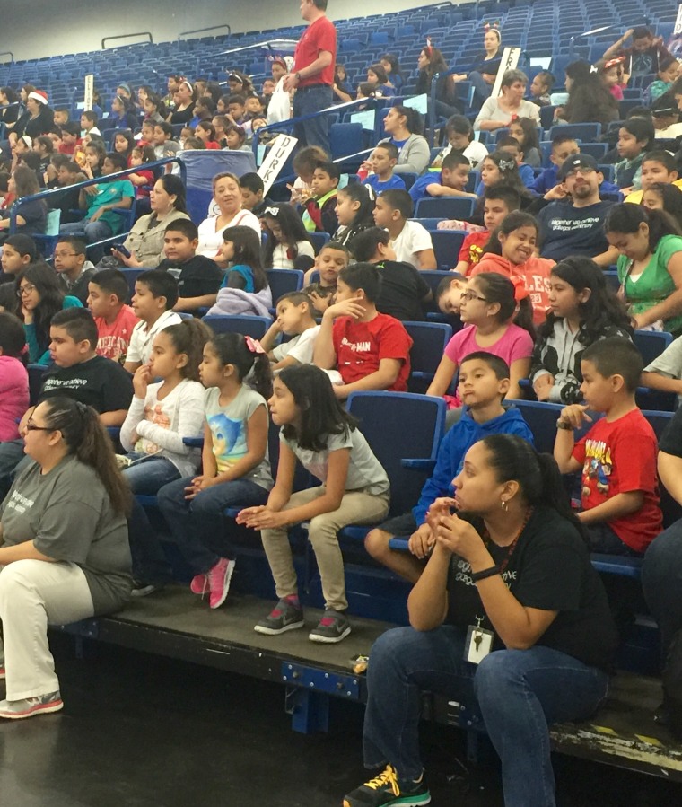 Children and families during the 2015 "Navidad en el Barrio" event in Houston, TX.