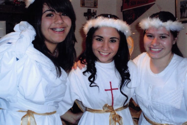 Griselda Nevarez (center) surrounded by a cousin and a friend after they performed a pastorela several years ago.