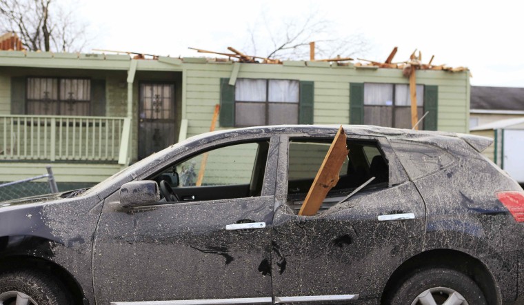 Image: Damage caused by a tornado is seen in a neighborhood in Birmingham