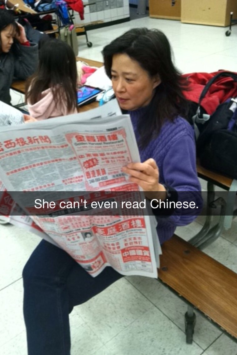 Frances Kai-Hwa Wang, outed by her children on Snapchat while glancing through the Chinese newspaper during Chinese school in Michigan.