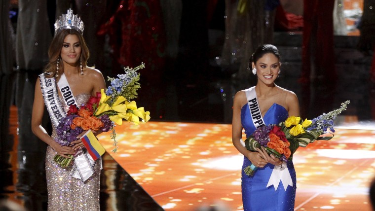 Image: Miss Philippines Pia Alonzo Wurtzbach joins Miss Colombia Ariadna Gutierrez onstage after Miss Colombia was initially crowned Miss Universe during the 2015 Miss Universe Pageant in Las Vegas