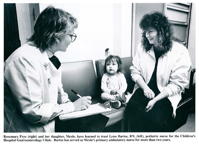 Bartos, left, is shown talking with Nicole and her mom in a photo featured in "Children's Nurse" in 1988.