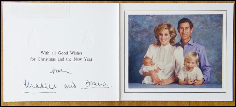 BNPS.co.uk (01202 558833)
Pic: Phil Yeomans/BNPS
Happy couple with William and new baby Harry - Xmas 1984.
A poignant collection of Royal Xmas cards sent to a member of staff and signed by Charles and Diana is coming up for auction.
The cards show the Xmas portraits from the earliest days of the marriage in 1982 and catologue the birth of William and Harry in the following years.
The happy smiling cards give no hint to the bitterness and tragedy that would engulf the couple in later years.