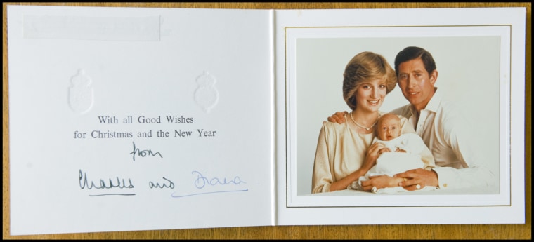 BNPS.co.uk (01202 558833)
Pic: Phil Yeomans/BNPS
Happy couple with William - Xmas 1982.
A poignant collection of Royal Xmas cards sent to a member of staff and signed by Charles and Diana is coming up for auction.
The cards show the Xmas portraits from the earliest days of the marriage in 1982 and catologue the birth of William and Harry in the following years.
The happy smiling cards give no hint to the bitterness and tragedy that would engulf the couple in later years.