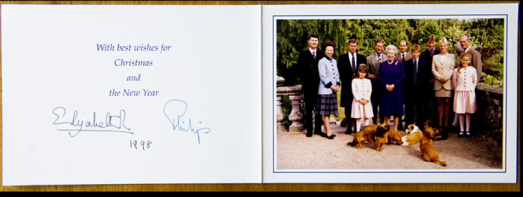 BNPS.co.uk (01202 558833)
Pic: Phil Yeomans/BNPS
A show of unity, without Diana and Sarah Ferguson, in Xmas card sent by the Queen in 1998.
A Royal Xmas cards sent to a member of staff and hand signed by the Queen and Prince Philip is being auctioned by Dukes of Dorchester.
