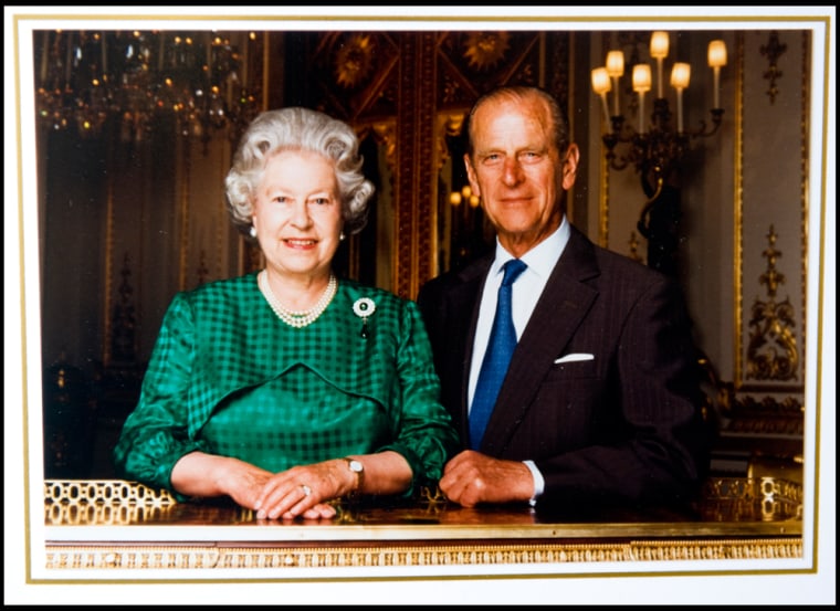 BNPS.co.uk (01202 558833)
Pic: Phil Yeomans/BNPS
Xmas card sent by the Queen and Prince Philip in 1997.
A Royal Xmas cards sent to a member of staff and hand signed by the Queen and Prince Philip is being auctioned by Dukes of Dorchester.