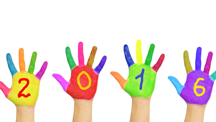 Kids colorful hands forming number 2016.