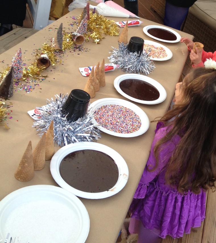 Ice cream cones rolled in chocolate and sprinkles