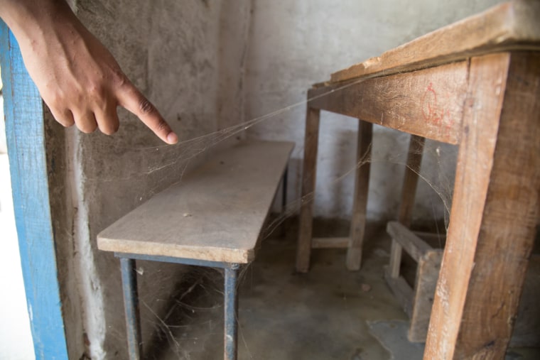Dust and cobwebs coat the desks and chaairs of Siddhartha Shishu Sadan Higher Secondary School in Janakpur, Nepal, which was shut down for three months amid safety concerns over political protests. November 2015.