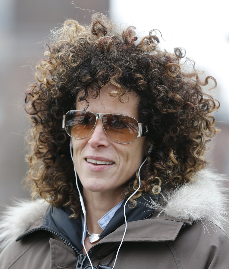 Image: Andrea Constand, who accuses Cosby of sexually assaulting her, walks in a park in Toronto