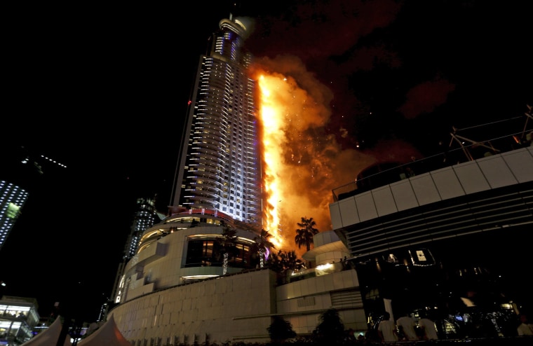Image: A fire engulfs The Address Hotel in downtown Dubai in the United Arab Emirates