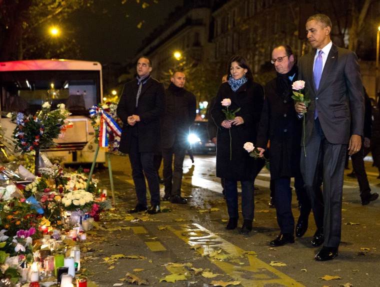 Barack Obama with French President Francois Hollande at a memorial after the Paris terrorist attack