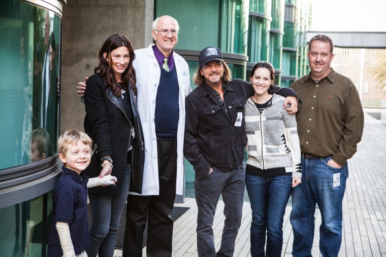 Pearl Jam's Eddie Vedder, his wife Jill with Mikey Fullmer and his parents, and Dr. Alan Lane. Ryan Fullmer and Jill Vedder are childhood friends and with their spouses, co-founders of the EB Research Partnership.