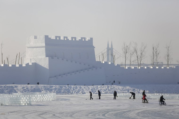 Image: A large snow sculpture is seen ahead of the Harbin International Ice and Snow Festival in the northern city of Harbin