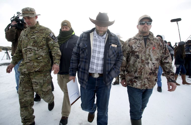 Image: Ammon Bundy departs after addressing the media at the Malheur National Wildlife Refuge near Burns