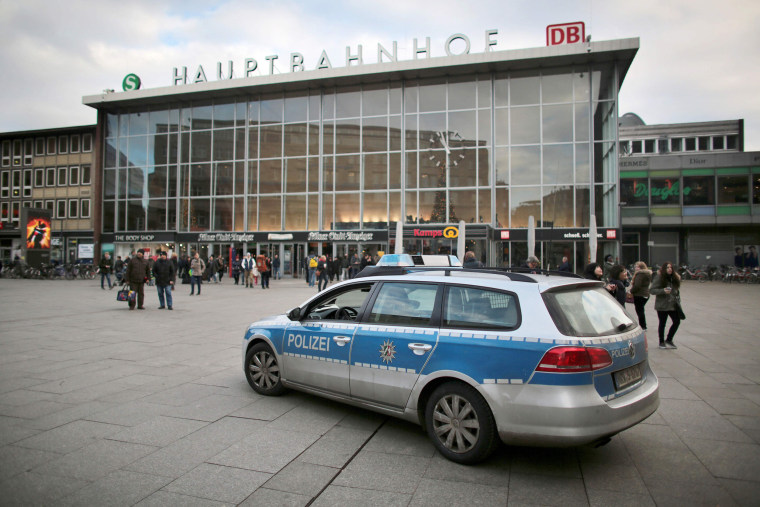 Image: Police car drives past Cologne's main train station