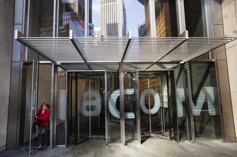 Image: File photo of woman exiting the Viacom Inc. headquarters in New York