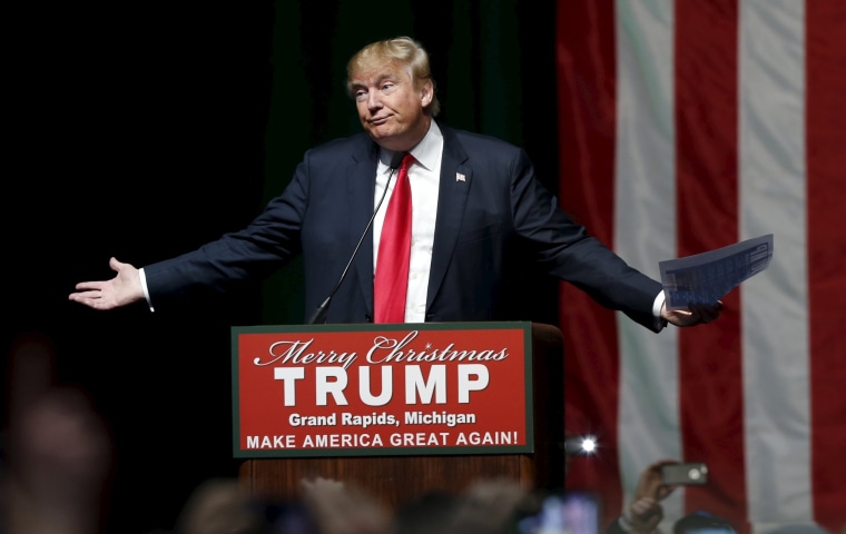 Image: U.S. Republican presidential candidate Donald Trump addresses the crowd during a campaign rally in Grand Rapids
