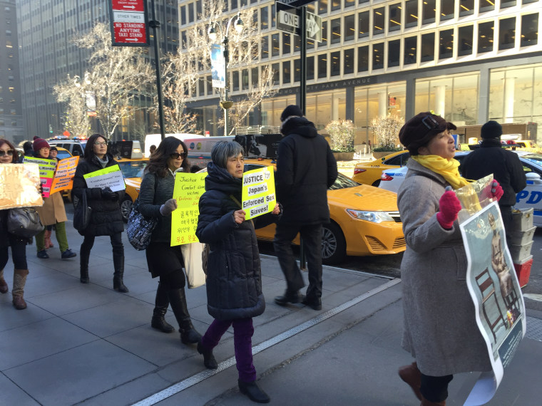 Protesters gather outside of the Consulate General of Japan in New York to denounce the agreement reached by the Korean and Japanese governments in December regarding World War II-era "comfort women." January 6, 2016.