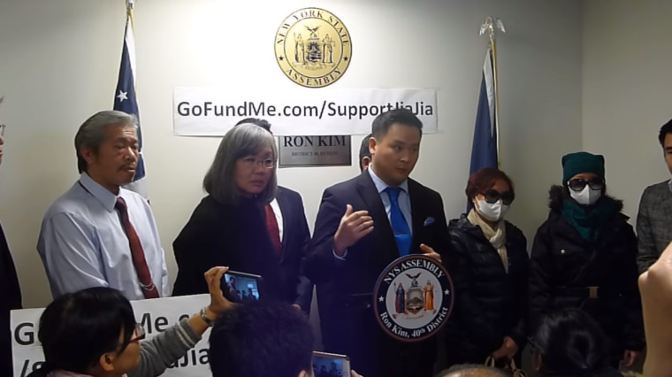 New York state Assemblyman Ron Kim announcing a fundraiser to support Jia Jia Liang (far right), who was slashed in the neck and face while walking from school in Queens.