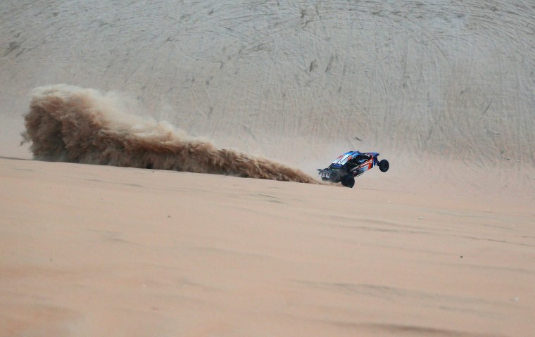 Image: TOPSHOT-UAE-MOREEB-DUNE-FESTIVAL-AUTO-RACING