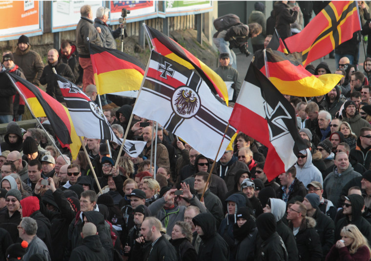Right-wing demonstrators march in Cologne, Germany, on Saturday Jan. 9, 2016.
