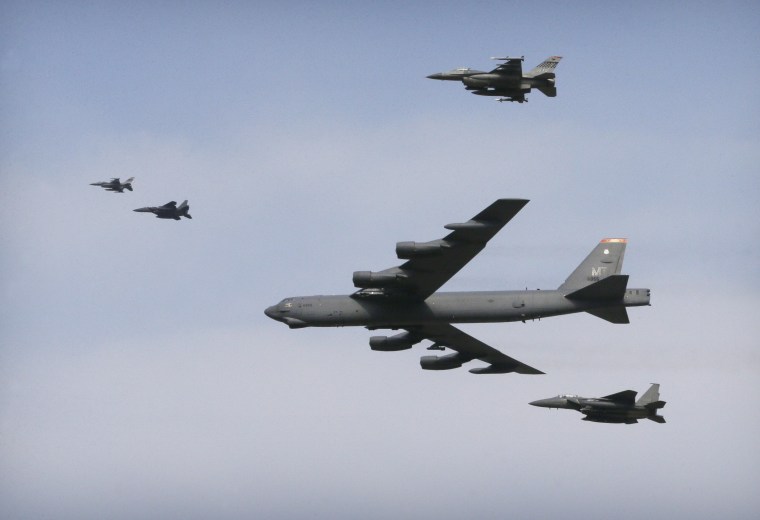 A U.S. Air Force B-52 bomber flies over Osan Air Base in Pyeongtaek, South Korea, Sunday, Jan. 10, 2016.