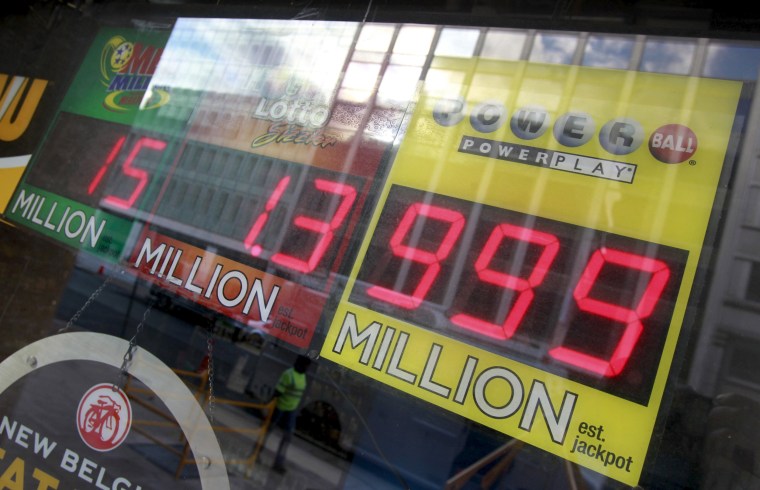 Image: A light sign could not fit the record highest power ball payout at a local liquor store in Washington