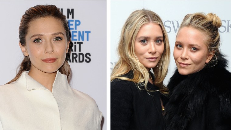 Actress Elizabeth Olsen and her designer sisters, twins Mary-Kate and Ashley Olsen