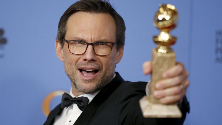 Image: Christian Slater poses backstage with the award for Best Performance by an Actor in a Supporting Role in a Series, Limited Series or Motion Picture Made for Television for his role in "Mr. Robot" at the 73rd Golden Globe Awards in Beverly Hills