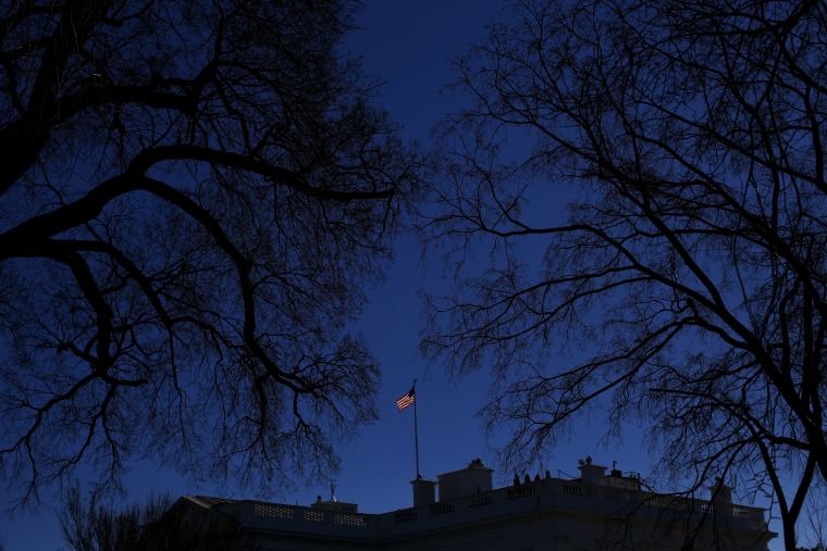Image: A U.S. flag flies at the White House in Washington