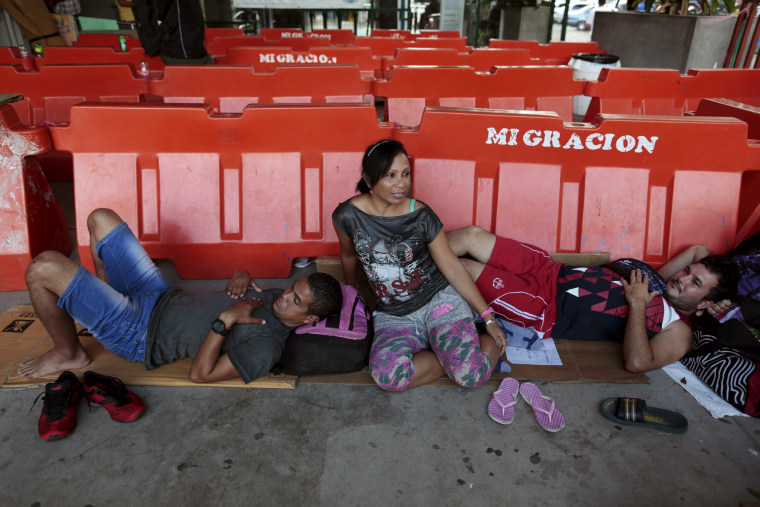 Image: Cuban migrants rests at a temporary shelter in the border between Costa Rica and Nicaragua in Penas Blancas, Costa Rica