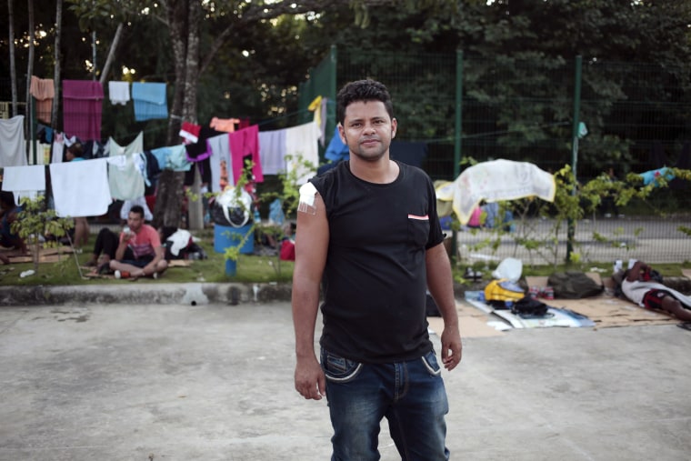 Image: Cuban migrant Lenin Rivacoba stands at the border between Costa Rica and Nicaragua, Penas Blancas