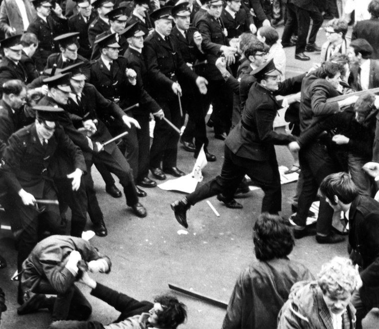 Image: A crowd of civil rights demonstrators scatter as the police begin a baton charge in Londonderry, Northern Ireland, on Oct. 5, 1968.