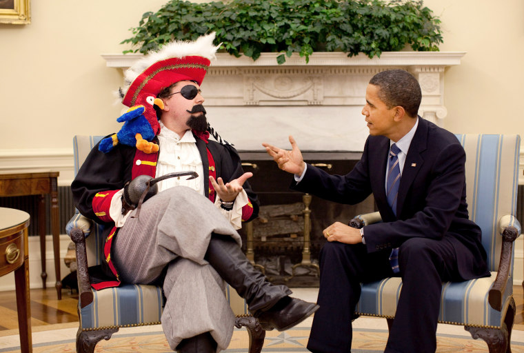 President Barack Obama with speechwriter Cody Keenan, who dressed as a pirate for an Oval Office photo shot for use in the President’s speech to the White House Correspondents Association dinner May 9, 2009.