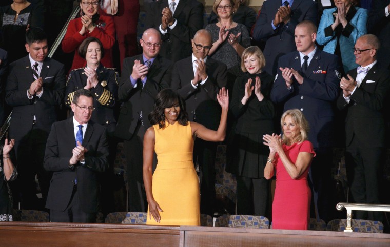 Image: U.S. first lady Michelle Obama waves from her box in the gallery while attending U.S. President Barack Obama's State of the Union address to a joint session of Congress in Washington