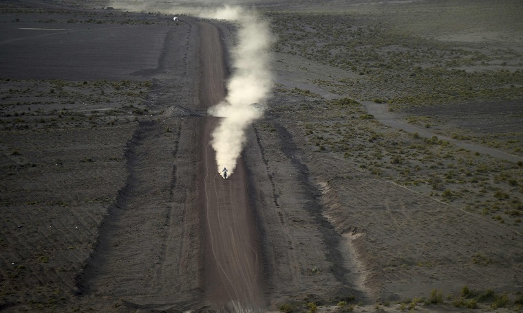 Image: Toby Price rides his motorcycle during Stage 6 of the Dakar 2016