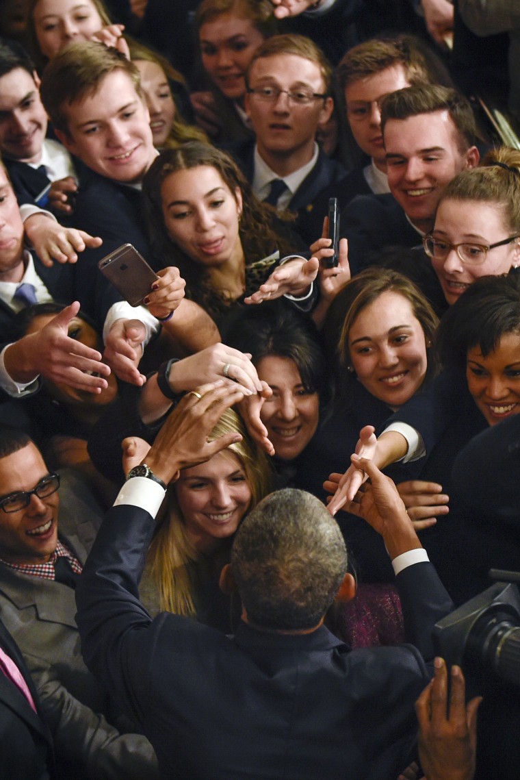 Image: President Barack Obama is greeted on the House floor on Capitol Hill