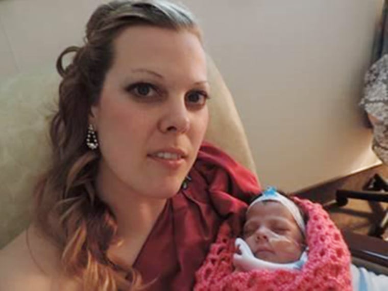 Image: Officer Kerrie Orozco with her newborn daughter