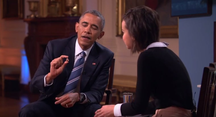 In this screenshot from an interview conducted Friday, Jan. 15, 2016, President Obama talks with YouTube vlogger Ingrid Nilsen about personal items he carries and the stories behind them.