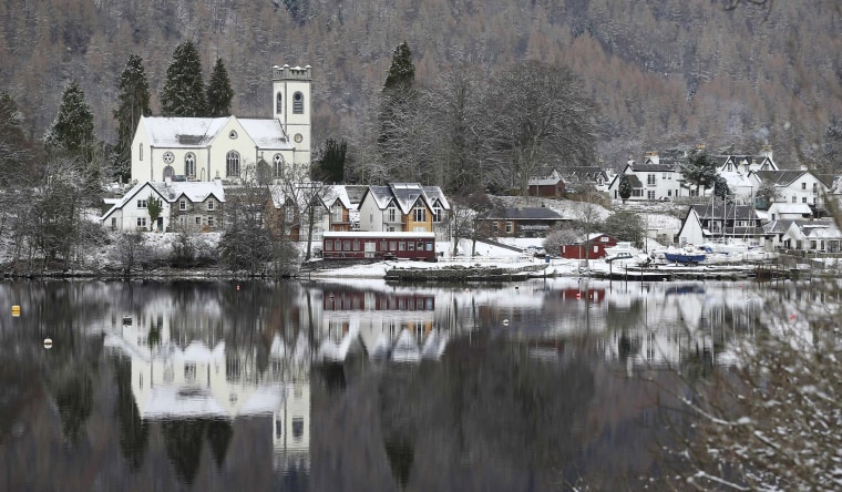 Image: Kenmore is reflected in Loch Tay  Scotland