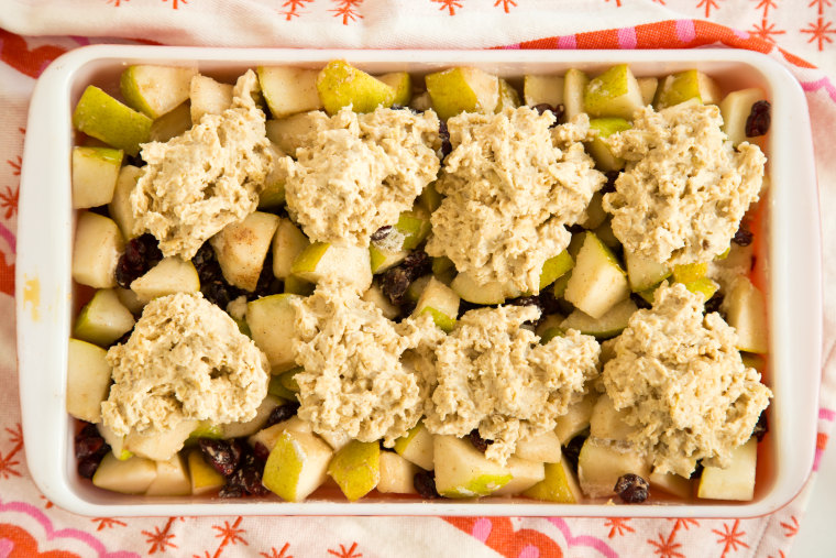 Breakfast Fruit Cobbler: With your hands or a spoon, drop hunks of the topping batter across the fruit to evenly cover the surface; about 8 blobs of topping should do it.