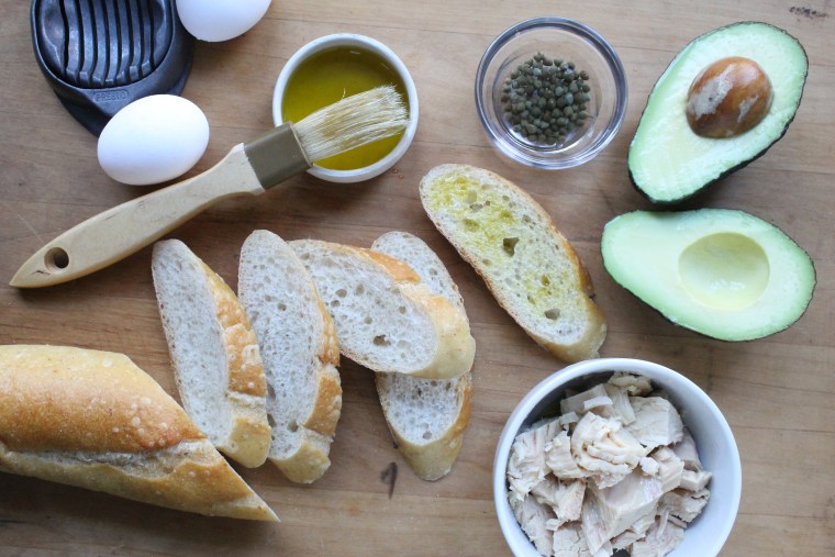 Avocado, Tuna and Egg Tartines: Brush the baguette slices with olive oil