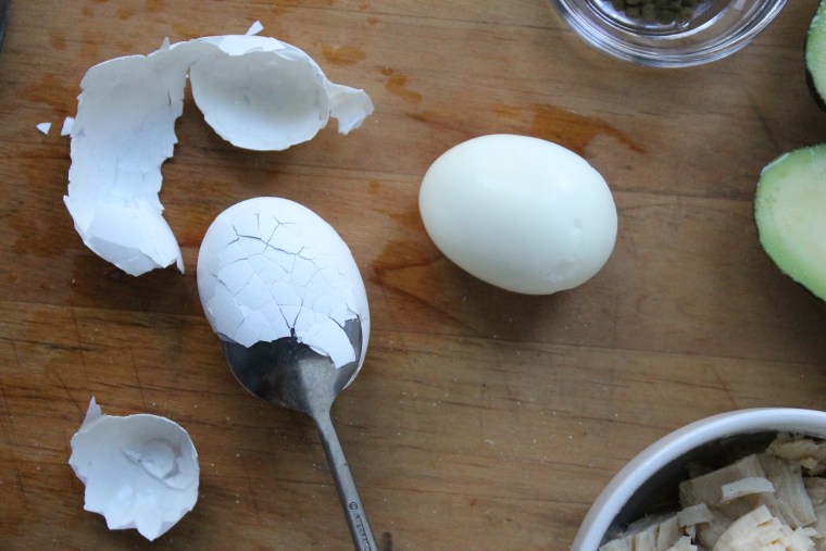 Avocado, Tuna and Egg Tartines: To peel the egg, slip a teaspoon under the shell and work it all around