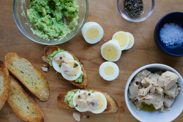 Avocado, Tuna and Egg Tartines: Spread the avocado, egg, tuna and capers on the toast